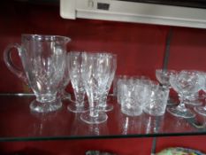 A Misc. collection of cut glass including a water jug, a sugar shaker, six whisky tumblers, four