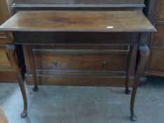 A Victorian Oak Hall Table. The table having cabriole legs and pad feet, approx. 107 x 46 x 85 cms.