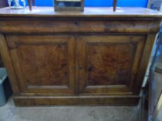 A Continental Antique Fruit wood (possibly Cherry) and Walnut Sideboard. The sideboard having one