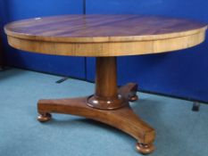 An Antique Rosewood Dining Table. The table being tilt top on a single pedestal base, Approx. 130