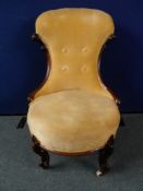 A Victorian Button Back Bedroom Chair, the chair having a swan shaped back with circular seat on