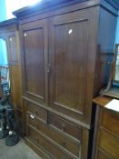 A Mahogany Tallboy - the piece having been converted to a wardrobe with two short and two long