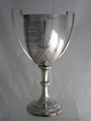 Solid silver Regimental Sporting Trophy. The large twin handled trophy inscribed ‘Presented by the