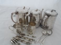 A quantity of Regimental silver plated ware. The items include a coffee pot, two hot water pots,