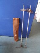 Vintage Ski Poles, the metal ski poles having leather handles and wrist straps with canvas bag.