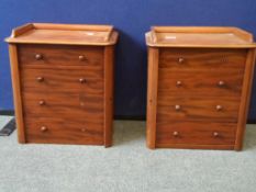 A Pair Of Small Victorian Mahogany Chests. Each chest having four graduated drawers, each chest