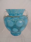 Sky Blue Vase The clear blue and Vaseline vase having twin handles. (waf)