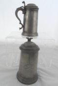 Antique Pewter Tankards two lidded tankards having glass bottoms, the first inscribed `Exeter