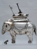 Solid silver Officers Regimental Table Lighter. The table lighter in the form of an Indian elephant,