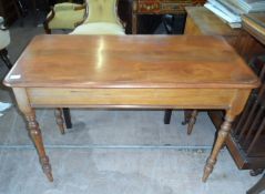 An Edwardian Hall Table. The table being pitch pine and having turned legs. Approx. 106 x 53 x 74