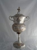 Indian silver Regimental Rugby Trophy. The large ornate, twin handled trophy features a frieze