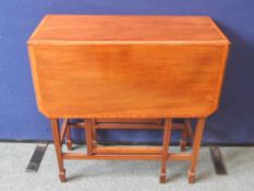 A Victorian Mahogany Sutherland Table. The table having inlaid banding to the edge and having