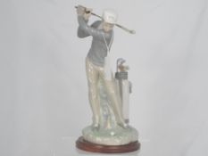A Lladro Figure " Golf Player ". No. 4824