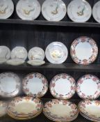 A PART ASHWORTH BROS. REAL IRONSTONE CHINA DINNER SERVICE DECORATED WITH REDS, BLUES AND GILT ON