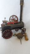 A VINTAGE TIN MODEL STEAM ENGINE WITH ACCESSORIES, APPROX. 22 X 29 cms