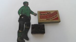 A COPPER BASED DIE STAMP DEPICTING VINTAGE FOOTBALLERS AND A TIN ARTICULATED CRICKETER AND A BOX