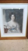 A FRAMED AND GLAZED COLOURED ENGRAVING OF A LADY SIGNED G. JOWETT, APPROX. 46 X 37 cms