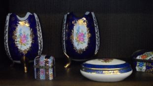 A COLLECTION OF LIMOGES PORCELAIN INCLUDING SIX ROYAL BLUE COFFEE CANS AND SAUCERS, A TRINKET BOX