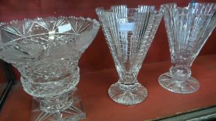 A PAIR OF ART DECO CUT GLASS VASES TOGETHER WITH A LARGE CUT GLASS PEDESTAL VASE. (3)