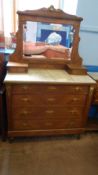 A FRENCH STYLE MARBLE TOPPED DRESSING TABLE HAVING A BEVELLED GLASS MIRROR AND TWO JEWELLERY DRAWERS
