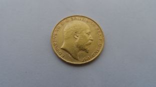 AN EDWARD VII 1906 HALF GOLD SOVEREIGN.