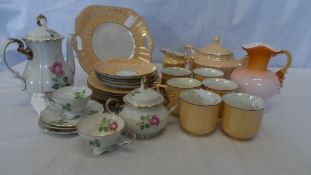 A PART ADOLF PERSCH CZECHOSLAVAKIAN TEA SET COMPRISING TWO SANDWICH PLATES, ELEVEN SIDE PLATES,