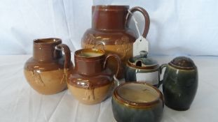 A GROUP OF THREE DOULTON & CO LAMBETH WARE ` HARVEST JUGS` IMPRESSED MARKS TO BASE TOGETHER WITH A