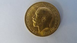 A GEORGE V 1914 GOLD FULL SOVEREIGN (GOOD CONDITION) B.P. BENEATH DRAGON B.M BENEATH THE NECK.