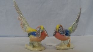 A PAIR OF PORCELAIN ORIENTAL PHEASANTS BY KARL ENS, GERMANY, DECORATED IN SUBDUED POLYCHROME ON