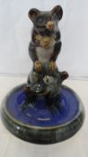 A ROYAL DOULTON LAMBETH WARE MOULDED PIN TRAY CENTRED BY A BROWN MOUSE HOLDING A NUT SEATED ON A