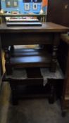 A PAIR OF YOUNGER TOLEDO OAK COFFEE TABLES, BOTH HAVING AN UNDER SHELF WITH TURNED DECORATION TO THE