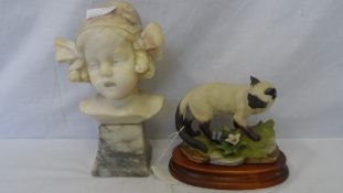 AN ANTIQUE MARBLE BUST OF A YOUNG GIRL WEARING A HAT WITH RIBBONS IN HER HAIR 25 cms HIGH TOGETHER