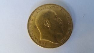 AN EDWARD VII 1909 GOLD FULL SOVEREIGN (GOOD CONDITION) B.P. BENEATH DRAGON D.S. BENEATH THE NECK.