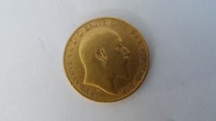 AN EDWARD VII 1902 HALF GOLD SOVEREIGN (FAIR CONDITION) D.S BENEATH THE NECK.
