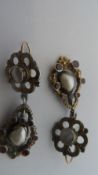 A PAIR OF VINTAGE INDIAN SILVER AND REAL PEARL DROP EARRINGS SET WITH GARNETS