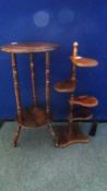 A CIRCULAR MAHOGANY OCCASIONAL TABLE, TURNED SUPPORTS AND LEGS HAVING AN UNDER SHELF AND ETCHES