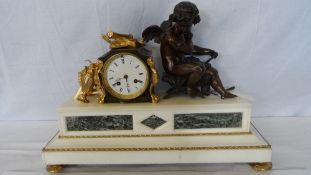 A CIRCA 19TH CENTURY BRONZE AND ORMULU MANTLE CLOCK DEPICTING A CHERUB ON A MARBLE BASE BY DENTS