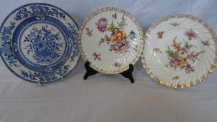 TWO HAND PAINTED DRESDEN CABINET PLATES DECORATED WITH FLOWERS, APPROX. 22 cms DIAMETER TOGETHER