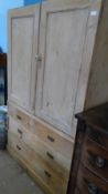 AN ANTIQUE PINE LINEN CHEST HAVING TWO PULL OUT DRAWERS ENCLOSED TO TOP - TWO SHORT AND TWO LONG