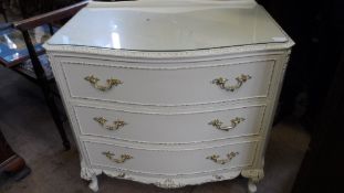 A CREAM AND GILT LOUIS XVI OLYMPUS STYLE BOW FRONTED CHEST OF THREE DRAWERS, APPROX. 27 X 48 X 74