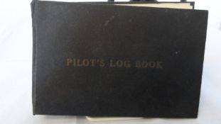 AN ORIGINAL PILOT`S LOGBOOK BELONGING TO CAPTAIN TIM HARINGTON SPENCER-COX, ROYAL ARTILLERY, 14th