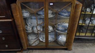 AN ART DECO WALNUT VENEERED DISPLAY CABINET