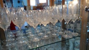A MISC COLLECTION OF CRYSTAL INCLUDING FIVE TUMBLERS, SIX CHAMPAGNE GLASSES, SIX RED AND SIX WHITE
