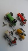 FOUR SCHUCO MICRO RACER MINIATURE CLOCKWORK CARS IN THEIR ORIGINAL BOXES WITH KEYS, MODELS 1040,