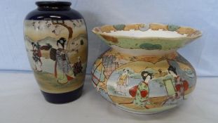 A BLUE ENAMEL SATSUMA EARTHEN WARE VASE DEPICTING GEISHA IN A LANDSCAPE SETTING, MARK TO BASE 20 cms