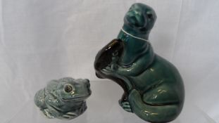 TWO POOLE POTTERY FIGURES INCLUDING A FROG AND AN OTTER.