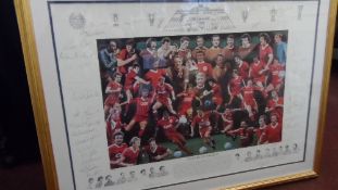 A FRAMED AND GLAZED LIMITED EDITION PRINT 430 / 2000 `LEGENDS OF ANFIELD` DEPICTING THE PLAYERS. THE