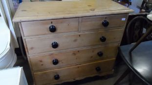 A RECLAIMED PINE CHEST OF TWO SHORT AND THREE LONG DRAWERS ON TURNED FEET, APPROX. 106 X 45 X 104