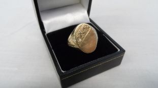 A GENT`S 9ct GOLD HALLMARKED SIGNET RING APPROX 8 gms.