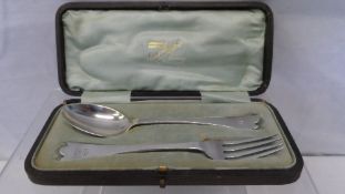 A CHESTER HALLMARKED SOLID SILVER CHRISTENING FORK AND SPOON IN ORIGINAL BOX CIRCA 1900.